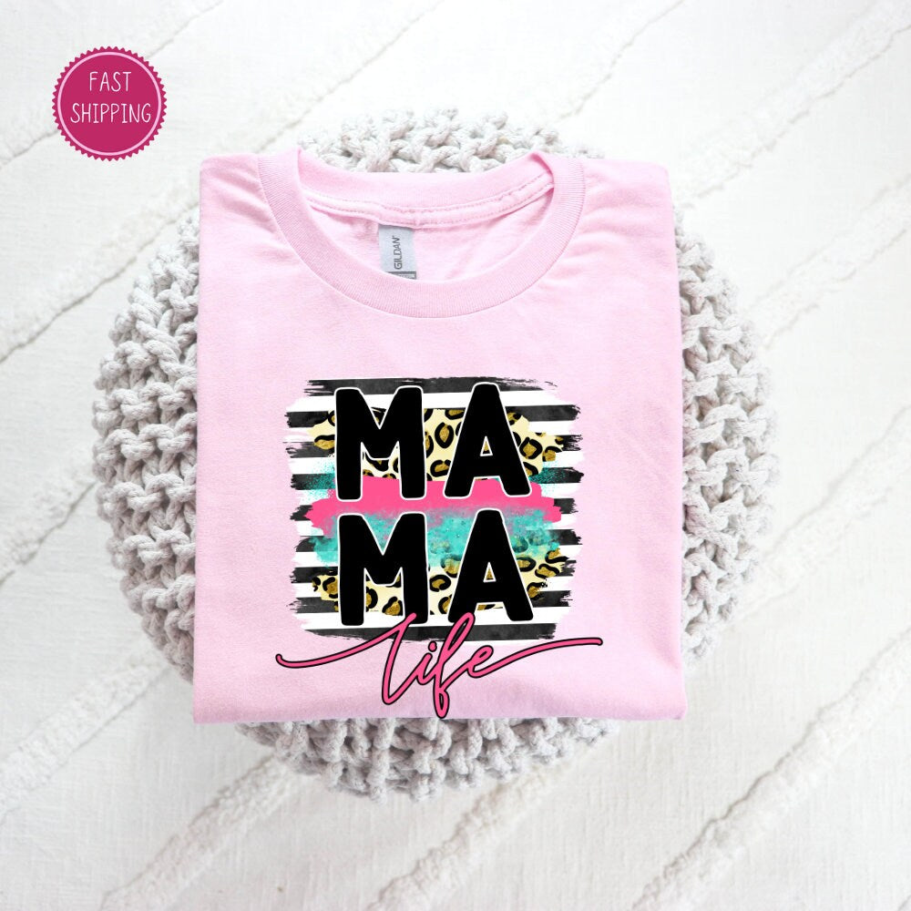 Stylish 'MAMA Life' t-shirt with modern brushstroke design and leopard print, a chic and comfy choice for moms this Mother's Day
