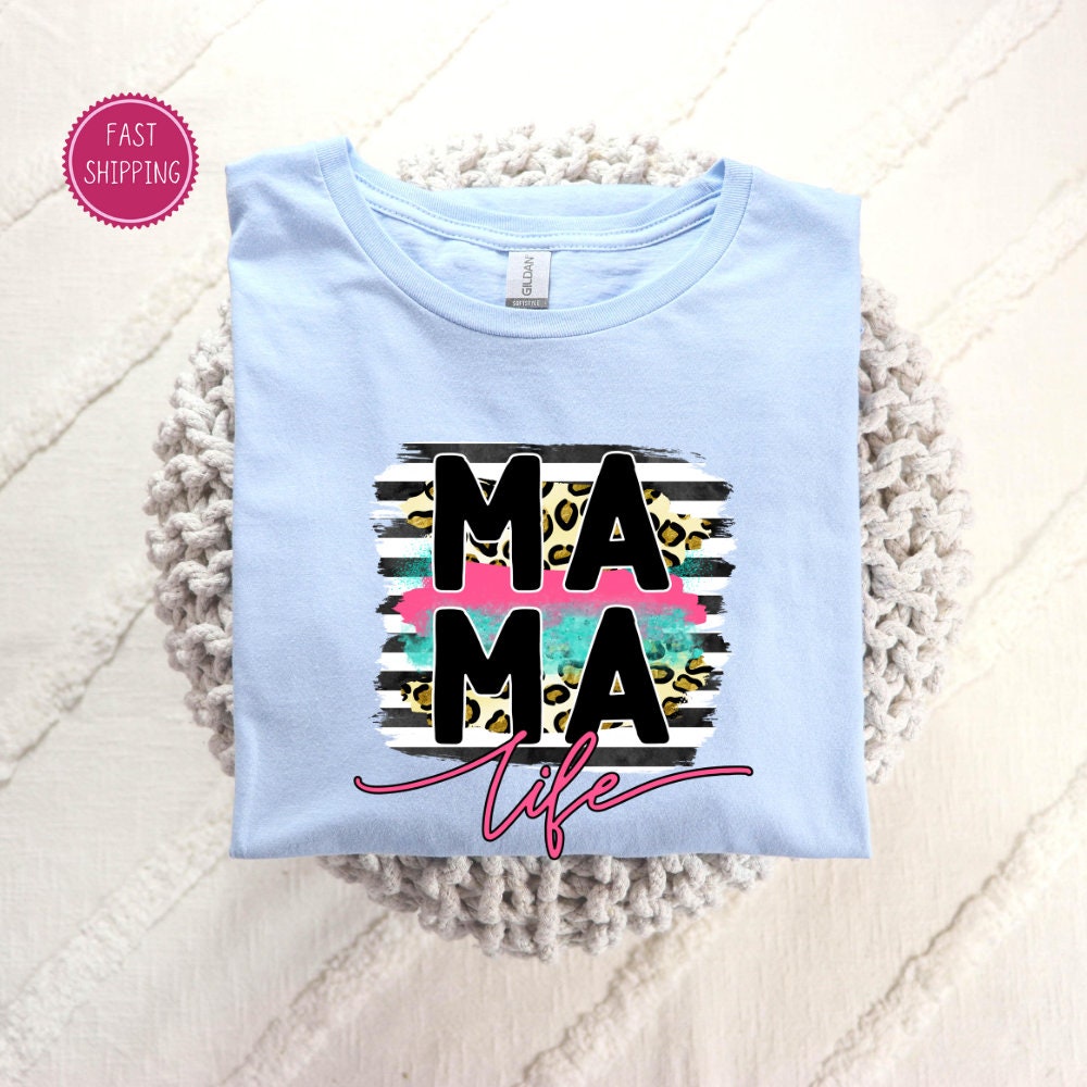 Stylish 'MAMA Life' t-shirt with modern brushstroke design and leopard print, a chic and comfy choice for moms this Mother's Day