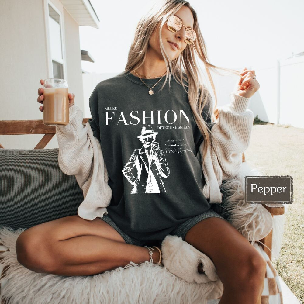 Stylish Pepper color t-shirt featuring 'Killer Fashion Detective Skills' design, perfect for crime show addicts and true crime podcast fans. Great for casual wear or as a unique gift for murder mystery lovers.