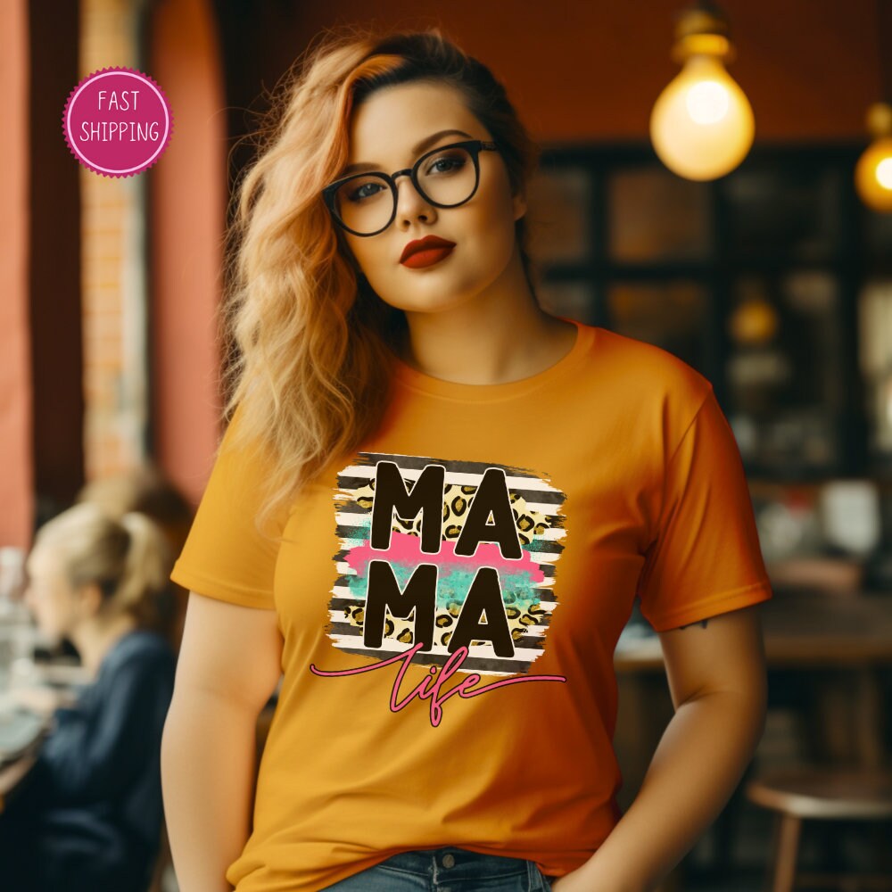 Stylish &#39;MAMA Life&#39; t-shirt with modern brushstroke design and leopard print, a chic and comfy choice for moms this Mother&#39;s Day