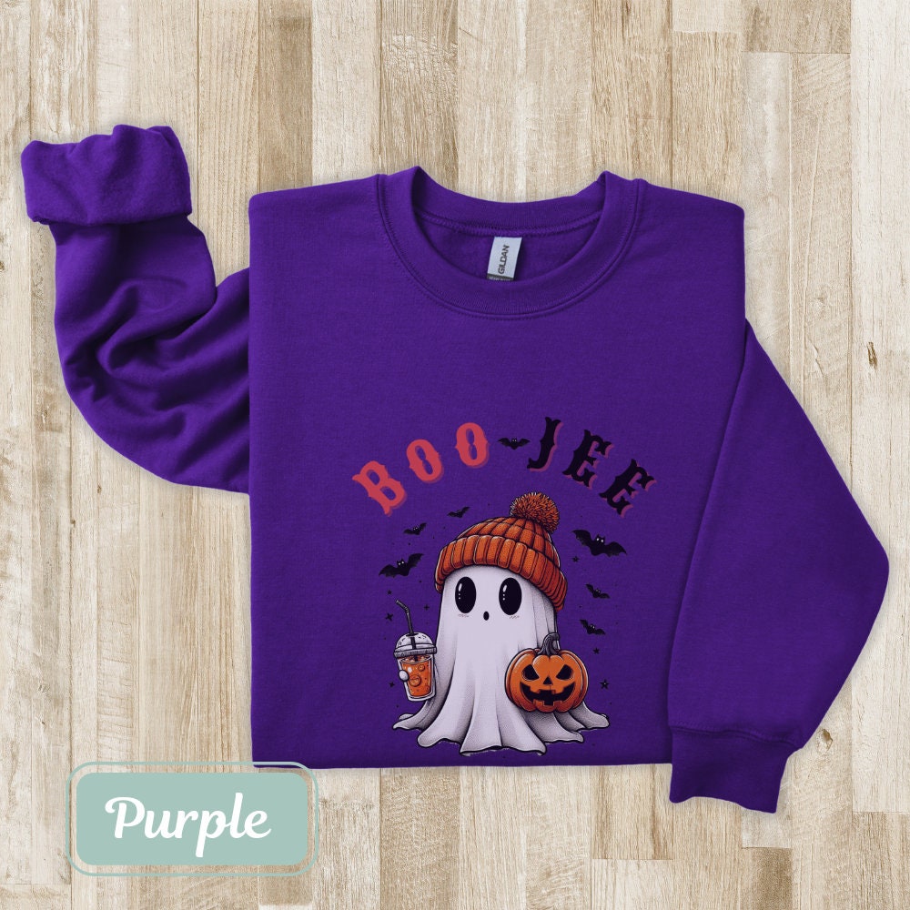 Women&#39;s purple &#39;Boo Jee&#39; Halloween sweatshirt, featuring a ghost with a pumpkin and coffee. Great for Halloween parties, fall outfits, and spooky shirt lovers. Perfect gift for nurses, teachers, moms, and grandmas. Celebrate Happy Halloween in style!