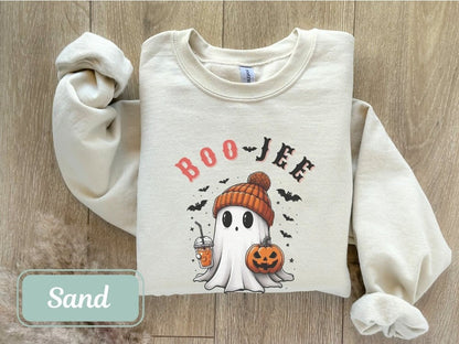 &#39;Boo Jee&#39; Halloween sweatshirt featuring a cute ghost with a pumpkin and coffee, perfect fall sweatshirt for Halloween teachers, women&#39;s Halloween outfits, and spooky parties. Ideal for ghost crewneck lovers, nurse, teacher, or wife gift.