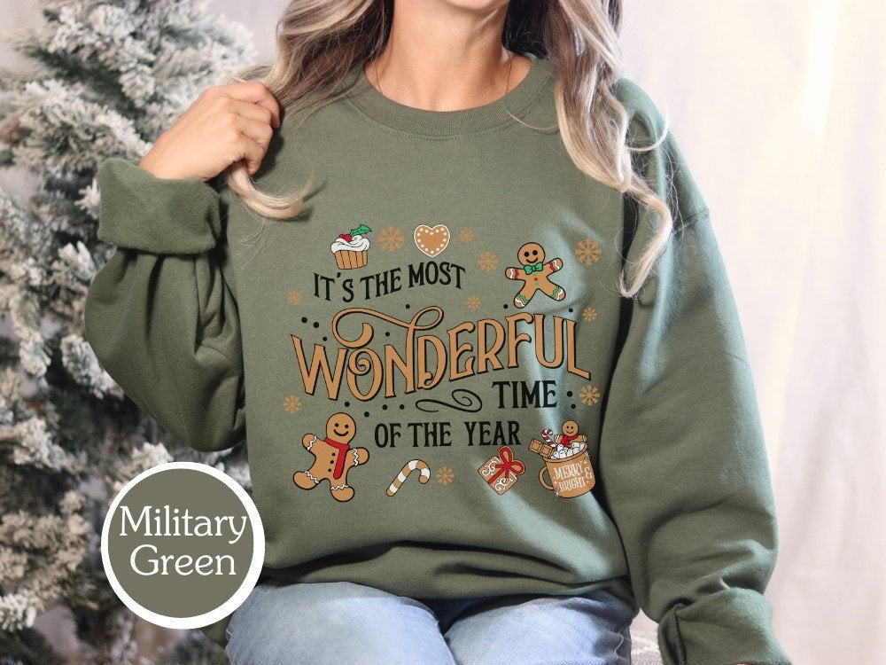 Cozy holiday sweatshirt in Military Green with &quot;It&#39;s the Most Wonderful Time of the Year&quot; design, perfect for Christmas gift, cookie lover, and family Christmas. Ideal for gingerbread fans and holiday sweatshirt collectors.