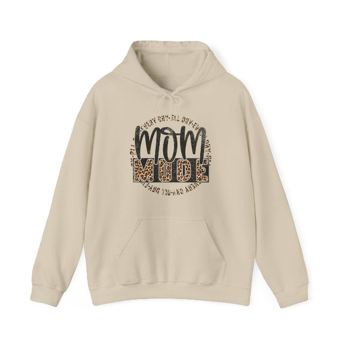 Celebrate motherhood with the ‘Mom Mode I’ hooded sweatshirt, featuring a beautiful blend of floral design and modern typography, a warm Mother's Day gift for cherished moms – available now at D1gital Emporium US.