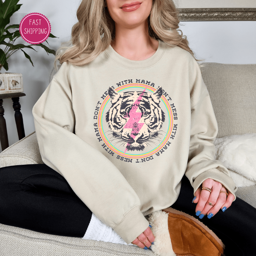 Bold 'Don't Mess With Mama' printed unisex white crewneck sweatshirt featuring a fierce tiger design, perfect as a stylish and empowering Mother's Day gift – available at D1gital Emporium US.