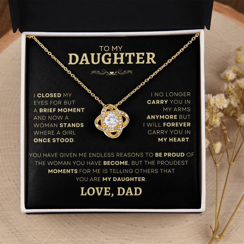 Timeless Gold-Plated Love Knot Necklace with a Touch of Sparkle, Presented in a Black Box with a Personal Message from Dad - Ideal Gift to Celebrate Your Daughter's Growth and Achievements.