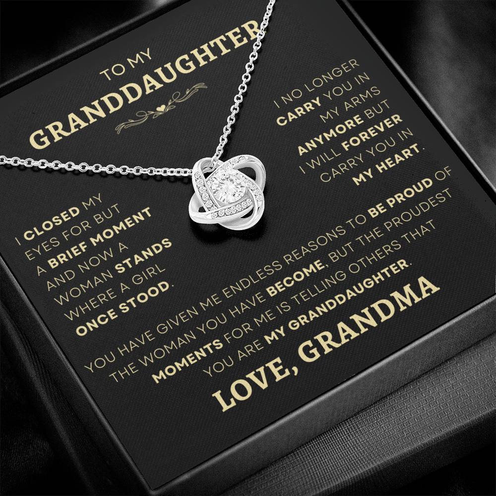 Elegant Loveknot Necklace with a message from Grandma, showcasing the eternal love and pride for a granddaughter - available now at D1gital Emporium US.