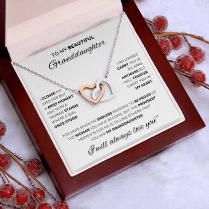 Cherish your granddaughter with this exquisite 'I Will Always Love You' Heart Necklace, showcasing intertwined hearts in rose gold and silver — a meaningful gift to celebrate your bond. Available now at D1gital Emporium US.