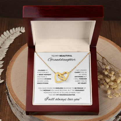 Gift your granddaughter a timeless treasure with this elegant intertwined heart pendant, a symbol of your endless love. Perfectly presented in a luxurious box, it's an unforgettable keepsake from D1gital Emporium US.
