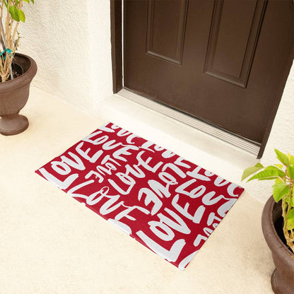 Valentine's Day Red and White Love Script Welcome Mat placed at home entrance, inviting warmth and romance. Shop now for the perfect Valentine's Day home decor accessory at D1gital Emporium US.