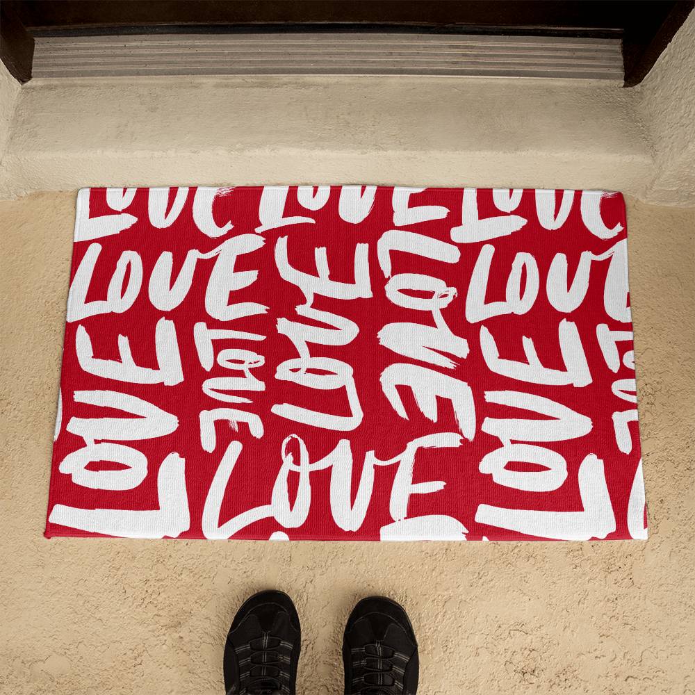 Red and white 'LOVE' script patterned Valentine's Day welcome mat, ideal for adding a touch of romance to your doorstep. Perfect gift to express affection, available now on D1gital Emporium US.