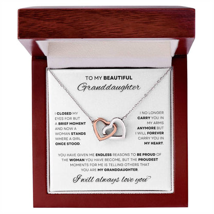 Gift your granddaughter a token of your heart with this elegant intertwined heart necklace in polished stainless steel and rose gold finish, presented in a luxury box with a loving message, exclusively from D1gital Emporium US.