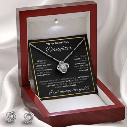Show your everlasting love with this elegant 'To My Beautiful Daughter' Love Knot Necklace and Earring Set, presented in a luxurious red gift box with a heartfelt message, perfect for making your daughter feel special. A timeless gift from d1gitalemporiumus.com that symbolizes the unbreakable bond between parent and daughter.